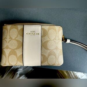 Brand New Coach wristlet in light khaki/chalk